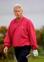 Former US President Bill Clinton smoking a cigar