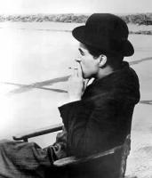 Charlie Chaplin smoking